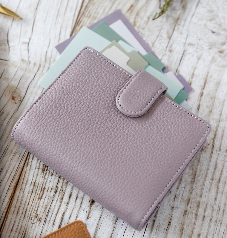 Filofax Norfolk Pocket Leather Organiser in Lavender on desk